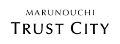 MARUNOUCHI TRUST CITY Logo